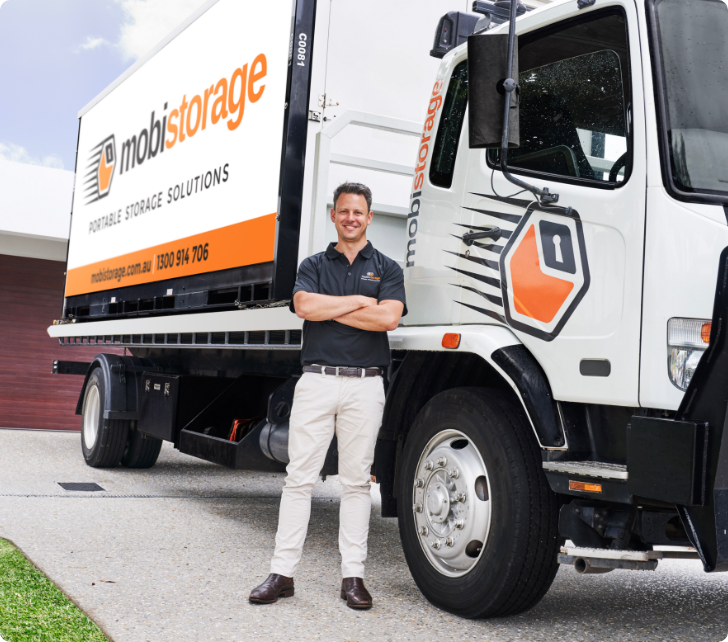 man standing in front of mobistorage truck